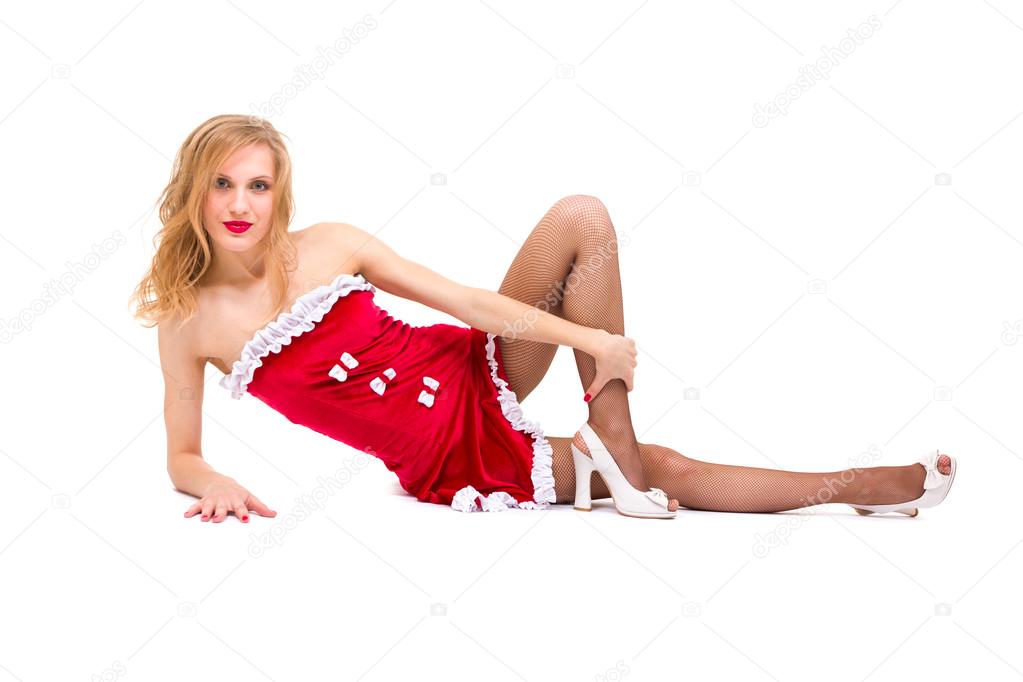 sexy girl wearing santa claus clothes lies