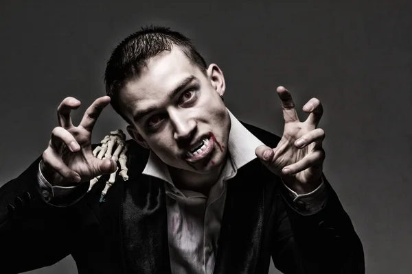 Dark dramatic portrait of a young vampire — Stock Photo, Image