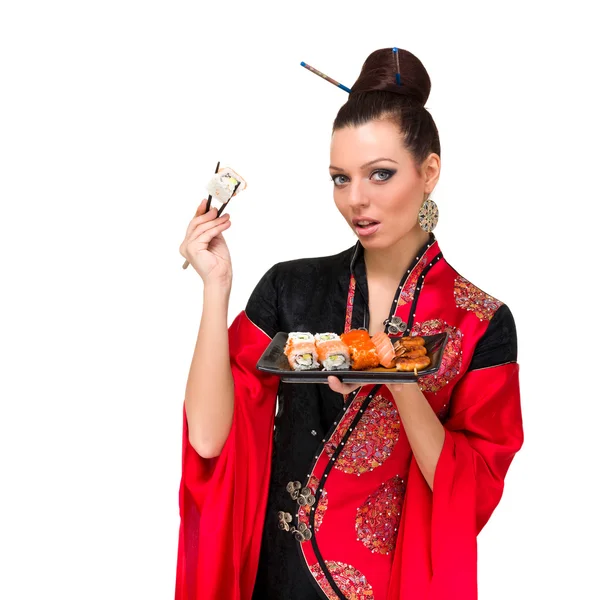 suşi ile geleneksel Kırmızı elbiseli kadın