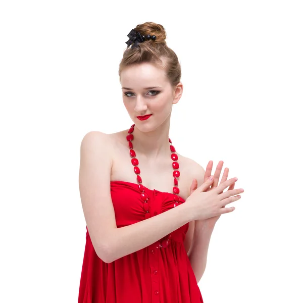 Young woman wearing a red dress and necklace — Stock Photo, Image