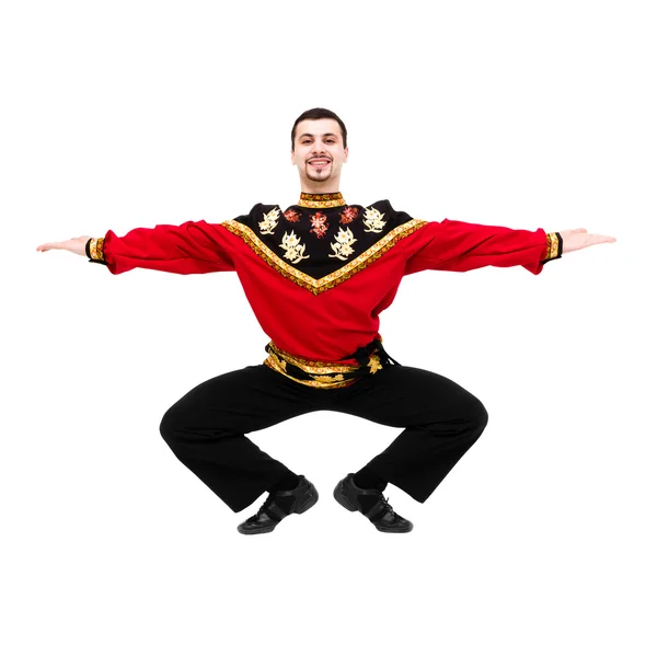 Young man wearing a folk russian costume dancing — Stock Photo, Image