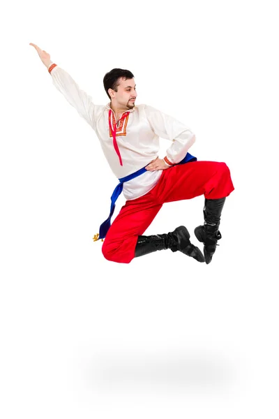 Man wearing a folk ukrainian costume jumping — Stock Photo, Image