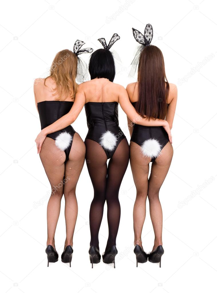 Sexy playgirls wearing a bunny costumes, back view