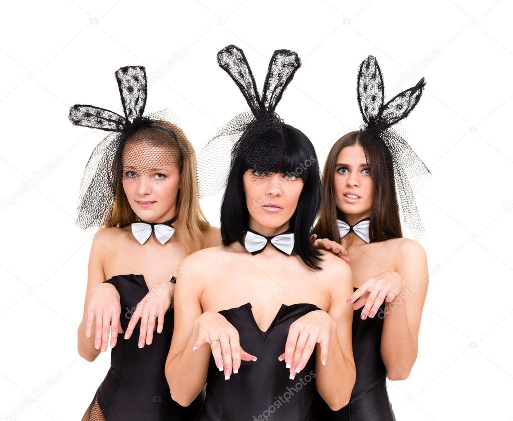 Three sad woman wearing a bunny costumes