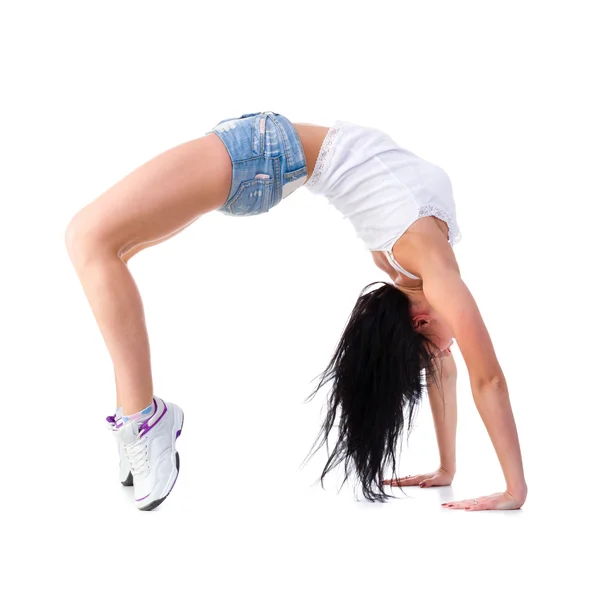 Frau turnt Handstand — Stockfoto