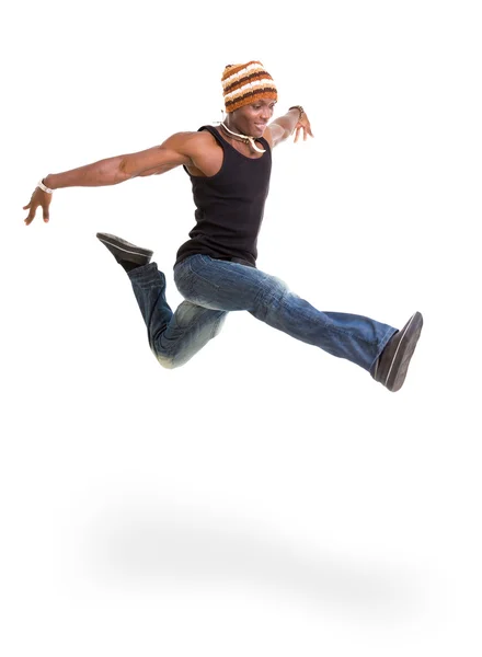 Portret van jonge vrolijke Afrikaanse man springen — Stockfoto