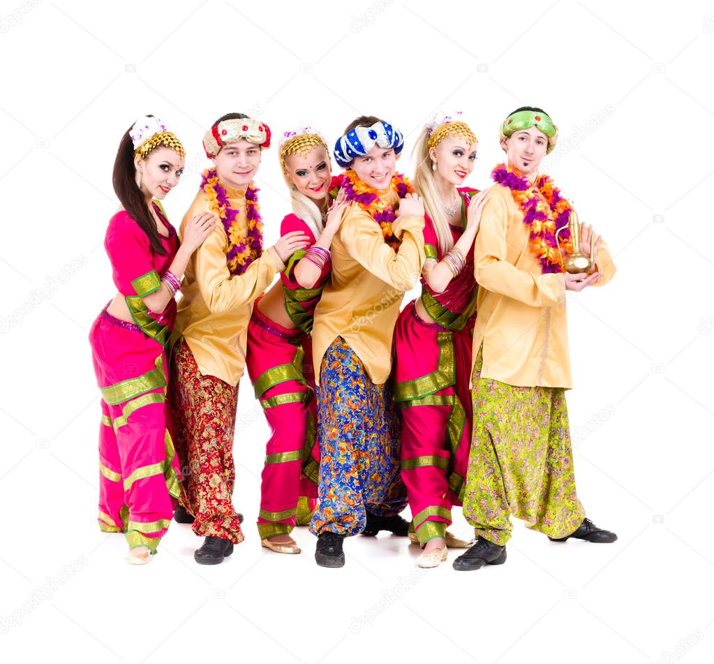 Dancers dressed in Indian costumes posing