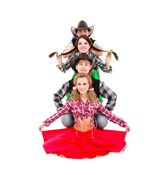 Kovboy kostümler giymiş kabare dansçı takım — Stok fotoğraf