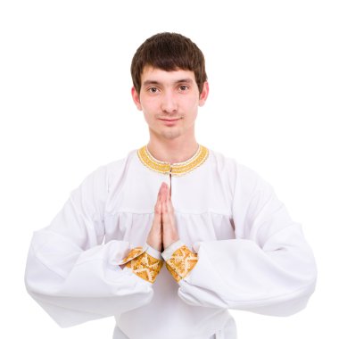 Namaste. mavi bir arka plan üzerinde dua eden adam.