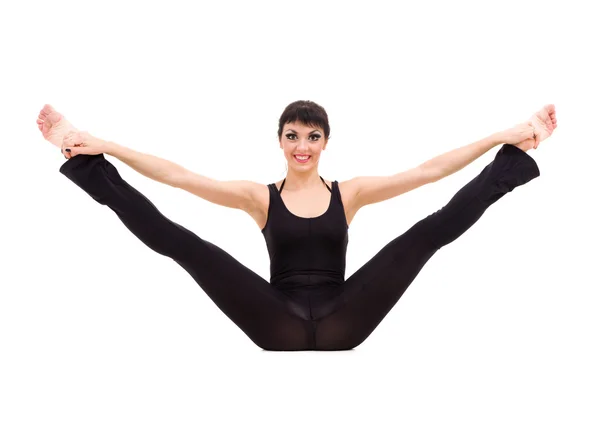 Giovane atleta donna che fa esercizio di stretching — Foto Stock