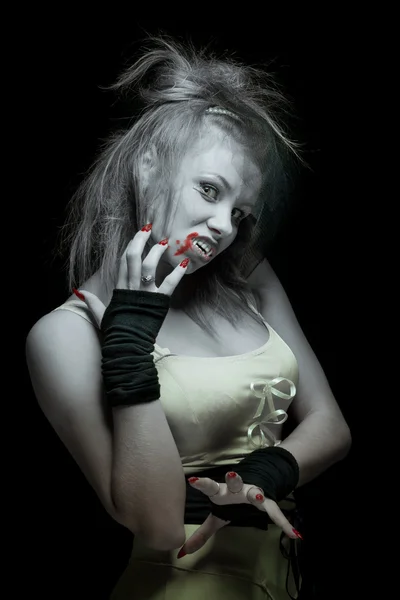 Woman vampire with fangs on a black background — Stock Photo, Image