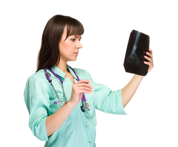 Female doctor looking at the x-ray picture of foot — Stock Photo, Image