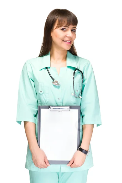 Mulher médico ou enfermeiro mostrando vazio em branco — Fotografia de Stock