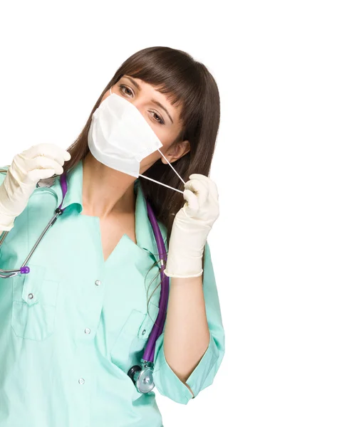 Medico medico donna togliersi la maschera — Foto Stock