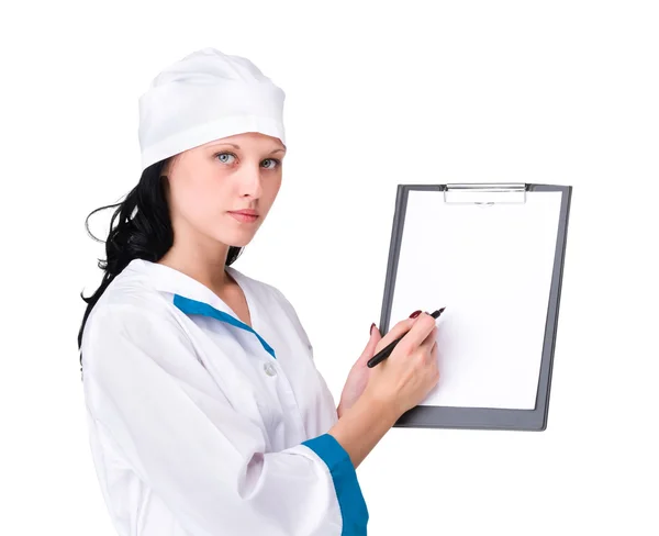 Mujer médico o enfermera mostrando vacío en blanco —  Fotos de Stock