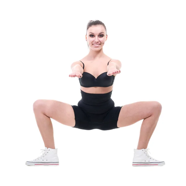 Молодая женщина фитнес делает упражнения — стоковое фото