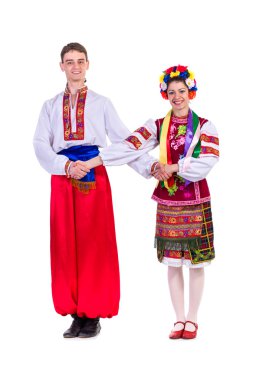 güzel dans eden çift Ukrayna Ulusal geleneksel kostüm giyim mutlu gülümseme, tam uzunlukta portre izole Lehçe