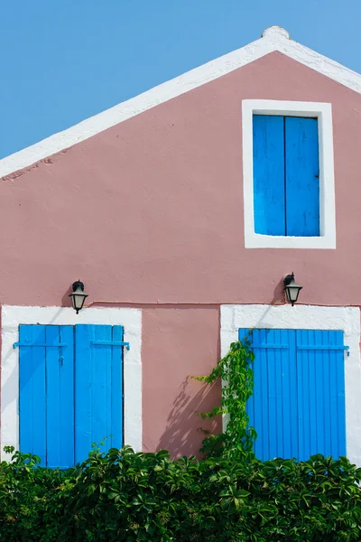 Traditional Greek village house with blue windows and doors — Stock Photo, Image