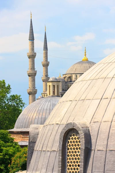 Istanbul Blue Mosque with Hagia Sophia dome in foreground Royalty Free Stock Images
