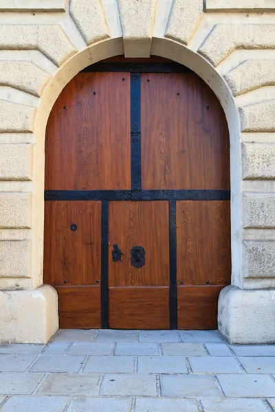 Massive wooden door — Stock Photo, Image