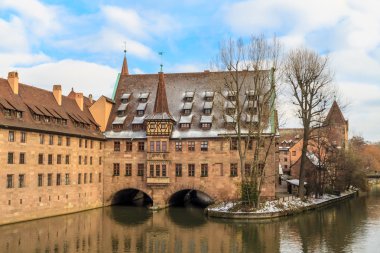 Nuremberg, ancient medieval hospital along the river, Germany clipart