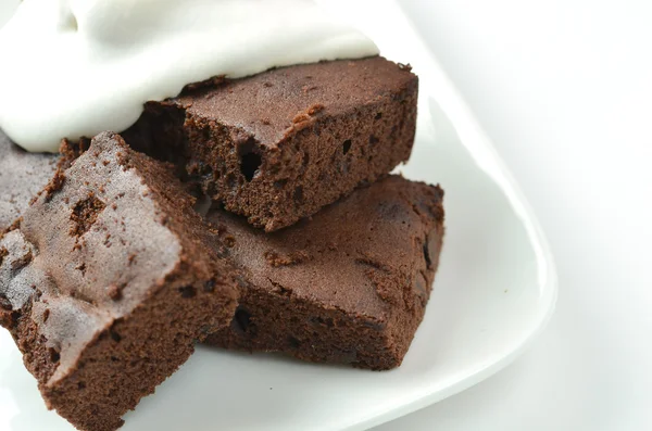 Brownie and cream — Stock Photo, Image