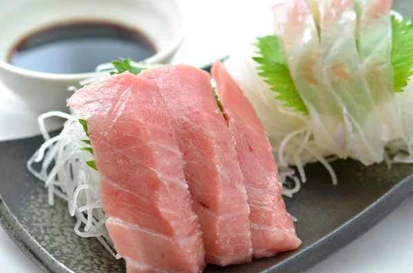 Sliced raw fish called Sashimi — Stock Photo, Image