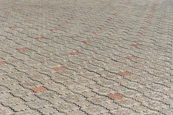 Textura de lajes de pavimentação de concreto na rua. — Fotografia de Stock