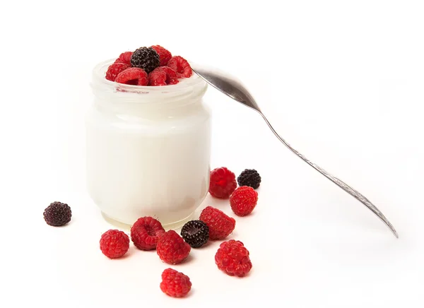 Joghurt mit Himbeeren Stockbild