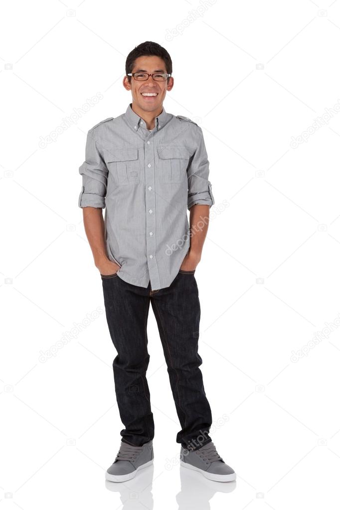 Man standing with his hands in pockets