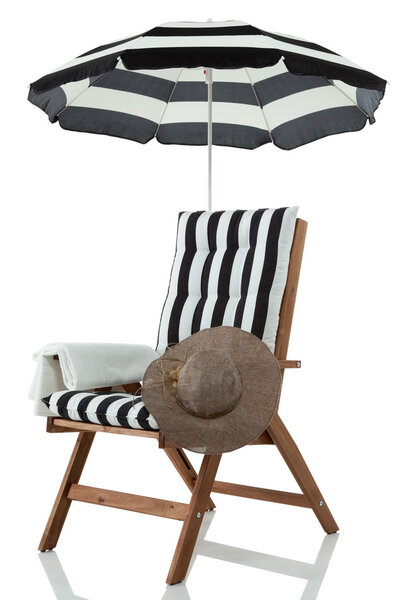 Beach chair with umbrella, towel and sunhat