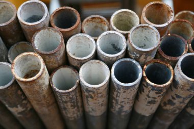 Scaffold pipe have been kept on stand or shelf for support construction job, The piping was used by scaffolder to install on job site and support worker to working at high.