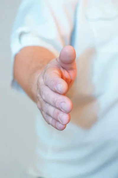 Extendió su mano en saludo — Foto de Stock