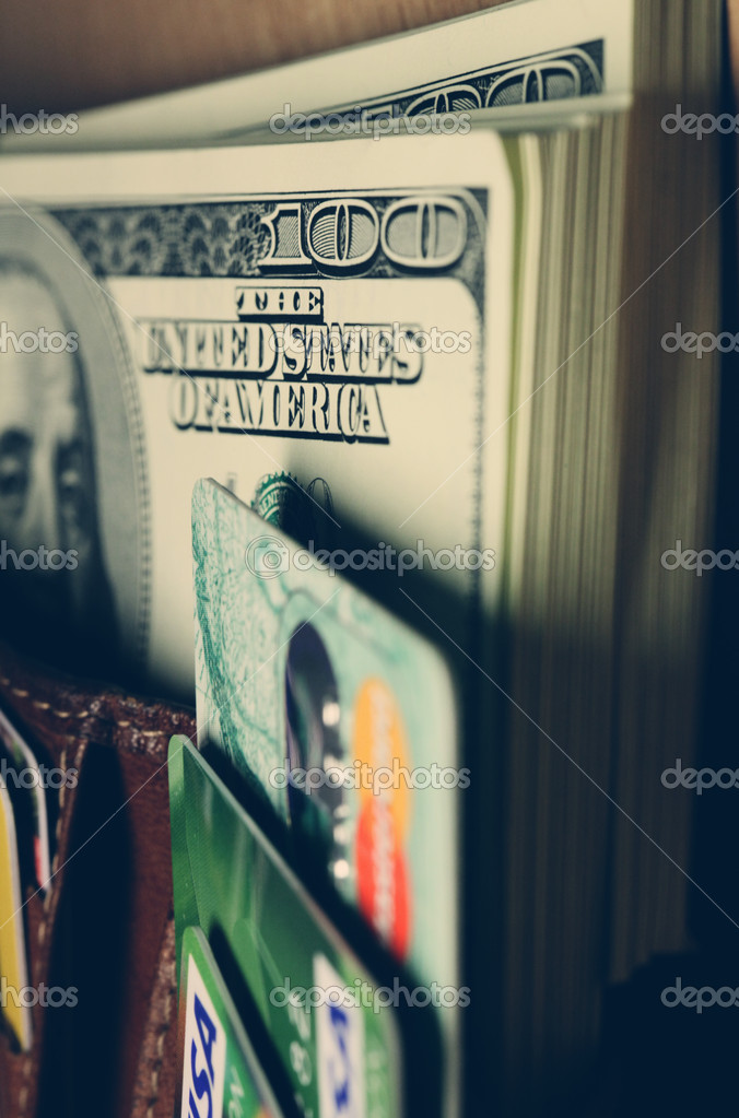 Dollar and credit cards in your wallet
