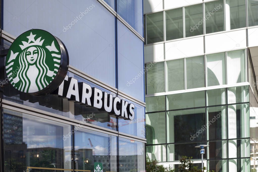 PARIS, FRANCE - June 12, 2022: Starbucks coffee sign. A sign for Starbucks Coffee.