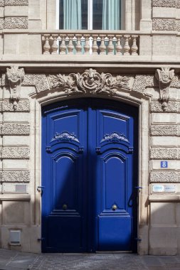 Entrance to an apartment building in Paris. Beautiful door. Paris, France , August 22, 2022