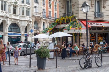 Cafe in Paris with flowers, Paris, France - August 22, 2022