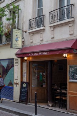 PARIS, FRANCE - September 05, 2022: Muftard Street, colloquially La Mouffe is a street in the 5th arrondissement of Paris, in the Latin Quarter. One of the most ancient and picturesque streets of Paris
