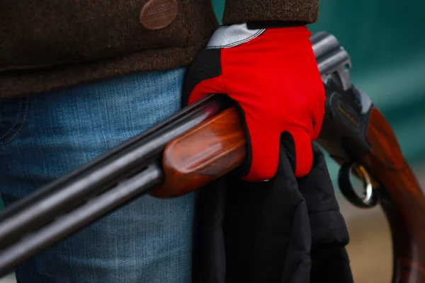 Weapon in hands — Stock Photo, Image