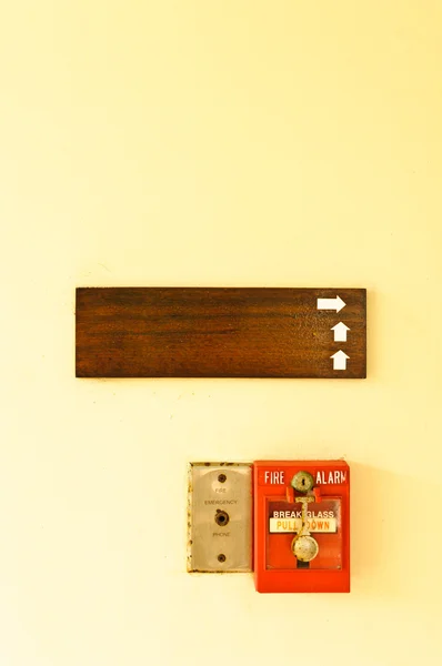 Fire alarm and wood board — Stock Photo, Image