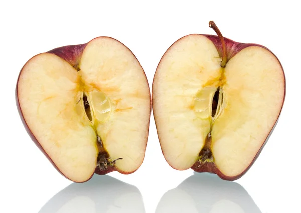 Red apple cut in half — Stock Photo, Image