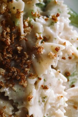 Creamy Italian alfredo bowtie pasta with broccoli