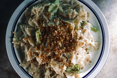 Creamy Italian alfredo bowtie pasta with broccoli