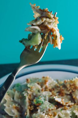 Creamy Italian alfredo bowtie pasta with broccoli
