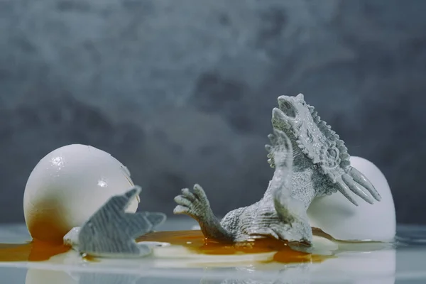 Creepy Abstract Hatched Dead Dinosaur Egg Yoke Concept — стоковое фото