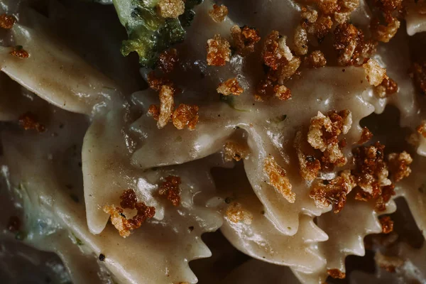 Creamy Italian alfredo bowtie pasta with broccoli