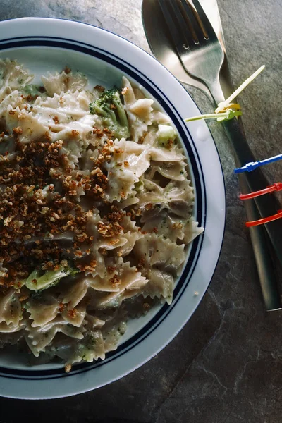 Diet restriction celiac disease concept. Silverware tied up with zip ties to prevent eating gluten 