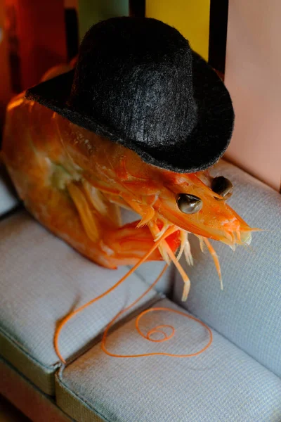 Cool Jumbo Shrimp Chilling Sofa Wearing Top Hat — стоковое фото