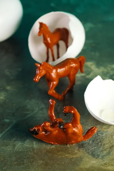 Faulty Defective Toy Horse Hatching Egg Abstract Concept — Zdjęcie stockowe
