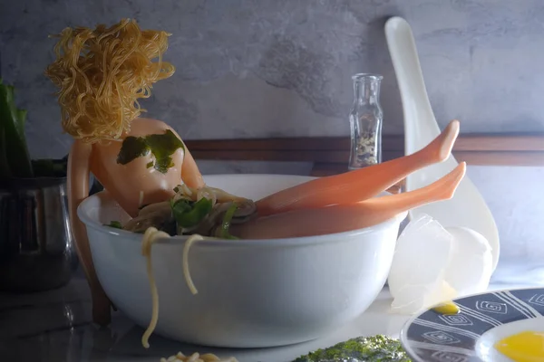 Relaxed Doll Bathes Japanese Ramen Noodles Concept — стоковое фото
